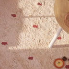 Sprinkle Washable Round Cotton Rug in Rust